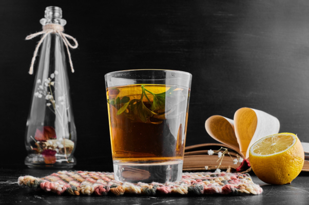 After party drink with lemon and herbal ingredients